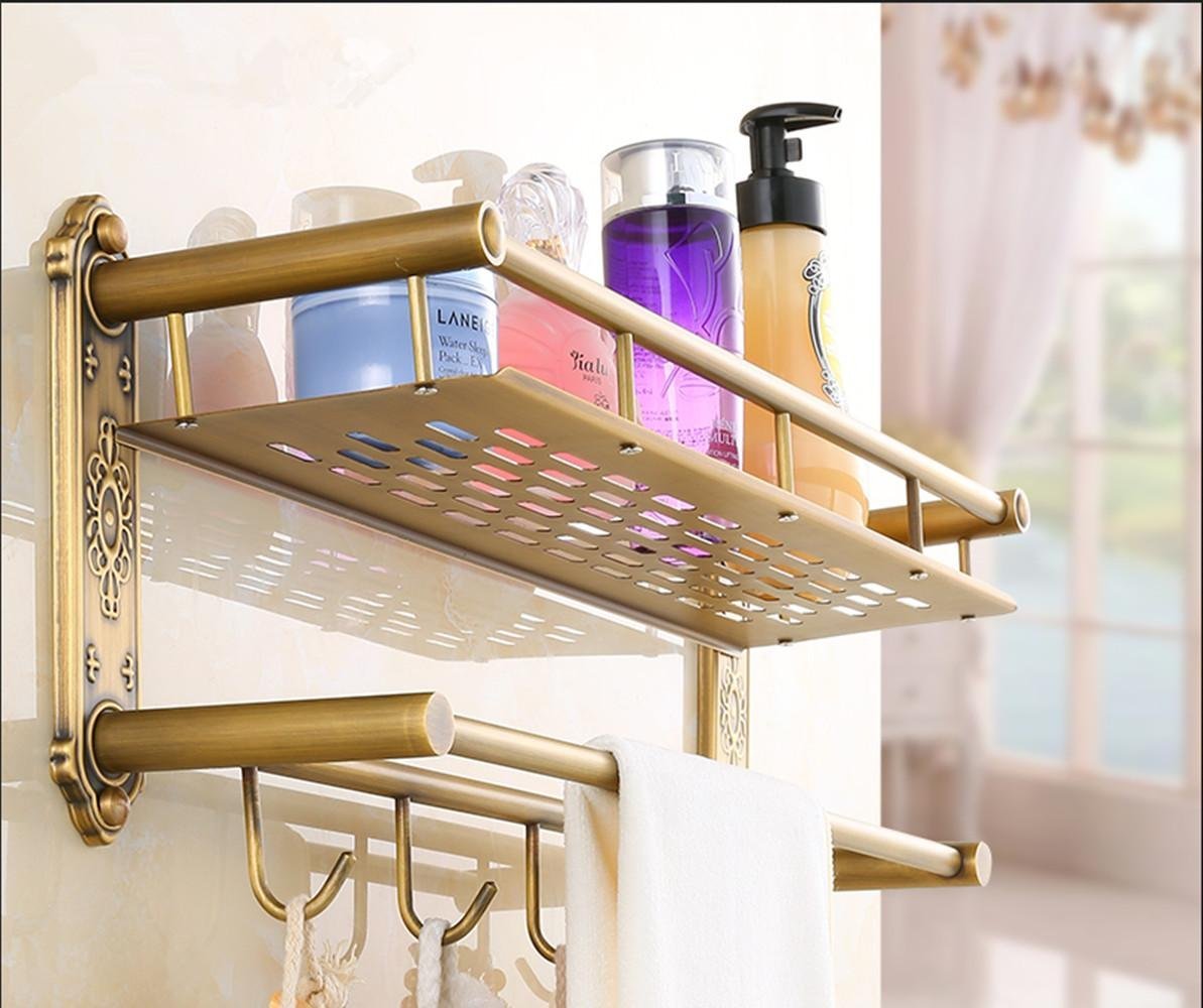 Juego de toallas de cobre antiguo y estante con perchas para baño continental