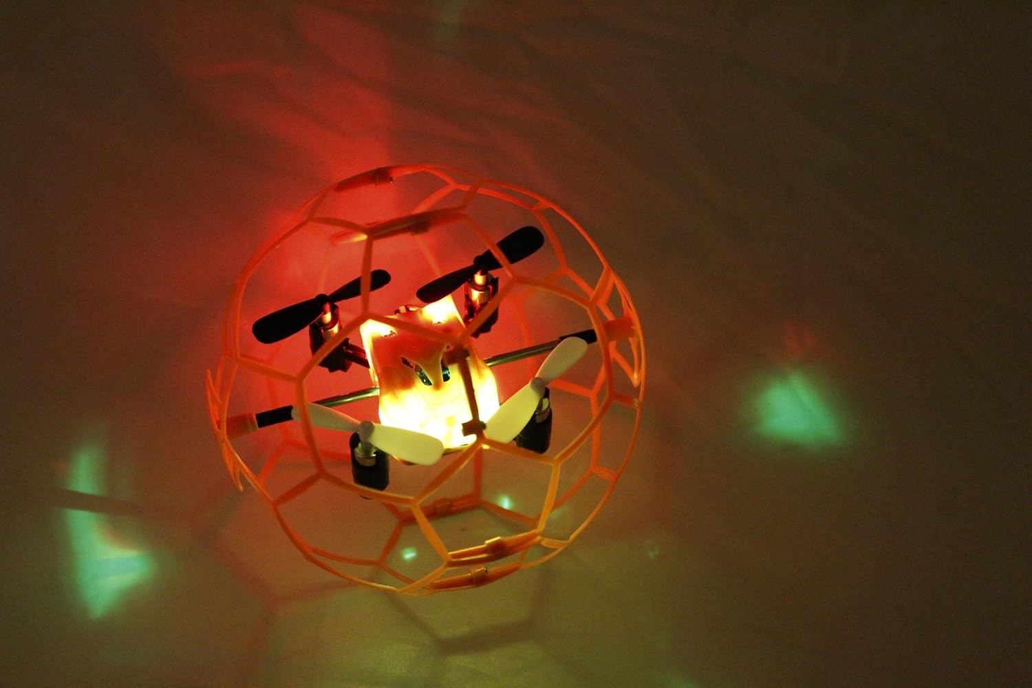 Haktoys Mini RC Drone in a Ball Shape, Protective Frame Cage 2.4GHz 4 CH 3D Flip/Roll LED RC Quadcopter with 6 Axis Gyroscope and Slow-Fast Speed Modes (HAK901)