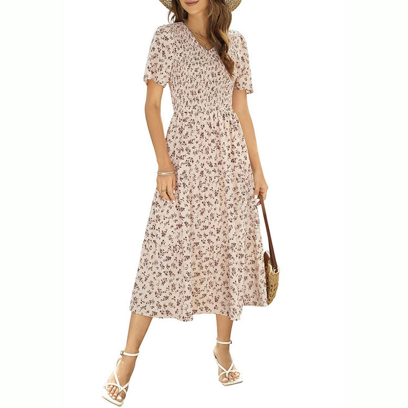 Robe midi d'été fluide avec poches pour un look confortable et élégant