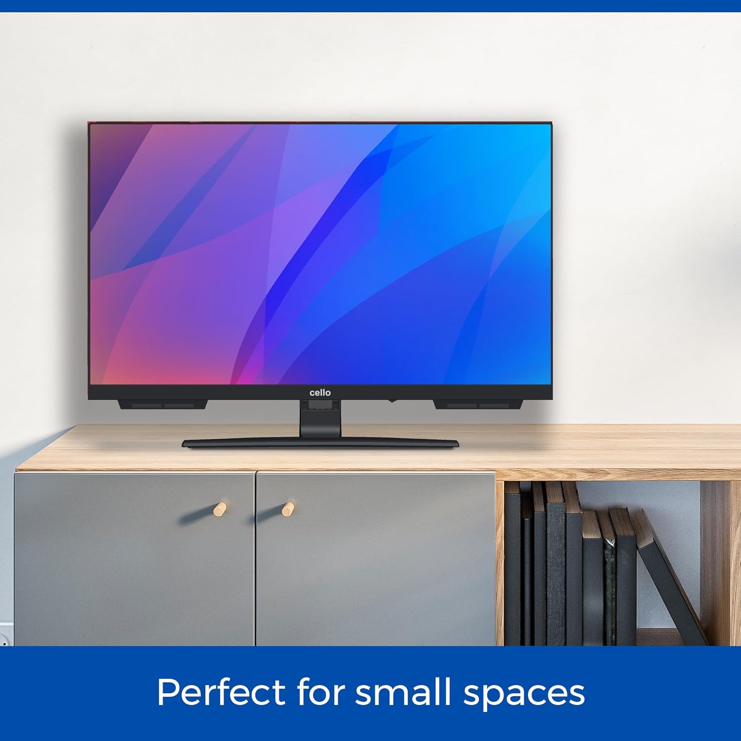 Cello C2224SH TV placed on a wooden cabinet, demonstrating its compact size for small spaces.