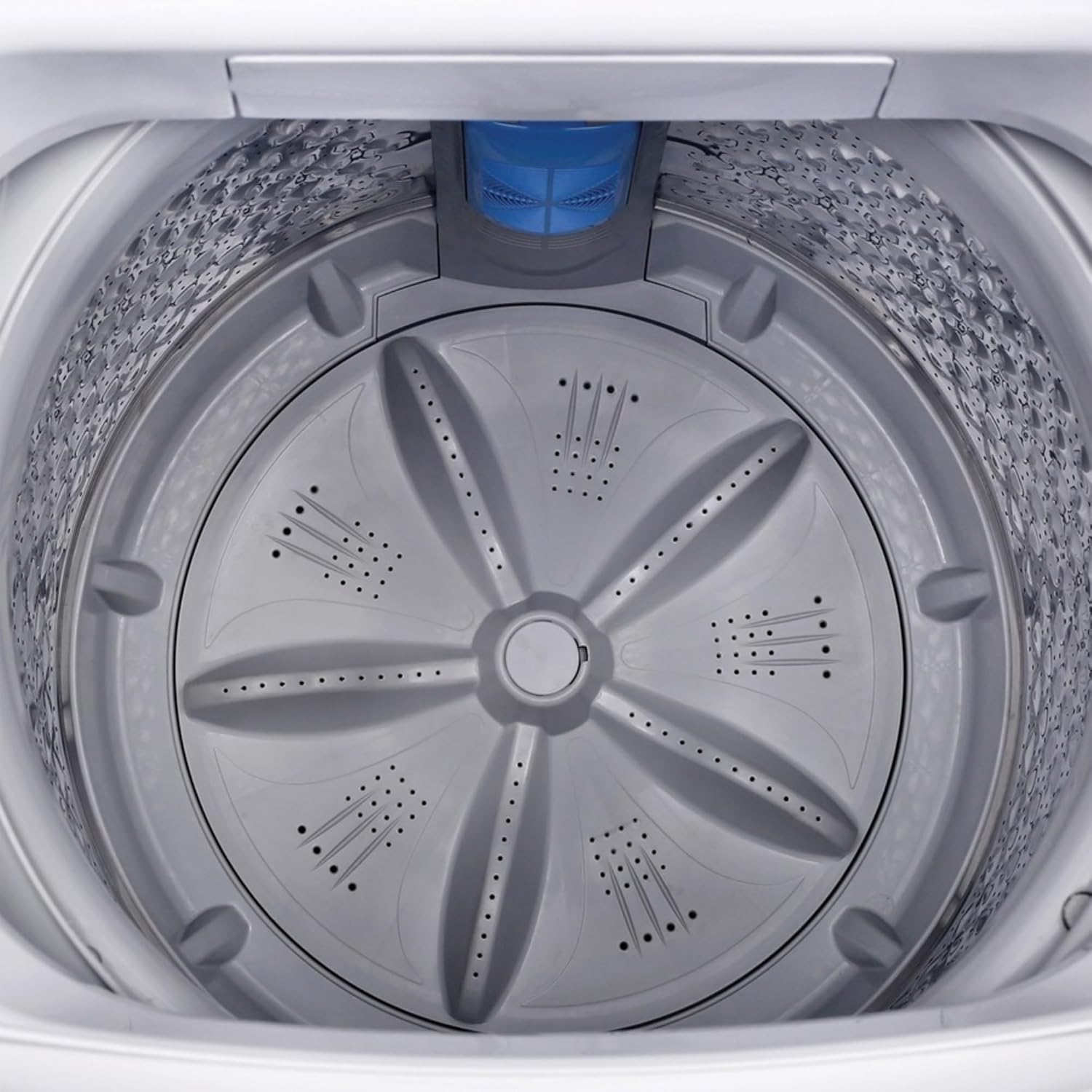 Dins view of the Magic Chef compact washer's stainless steel tub with agitator.