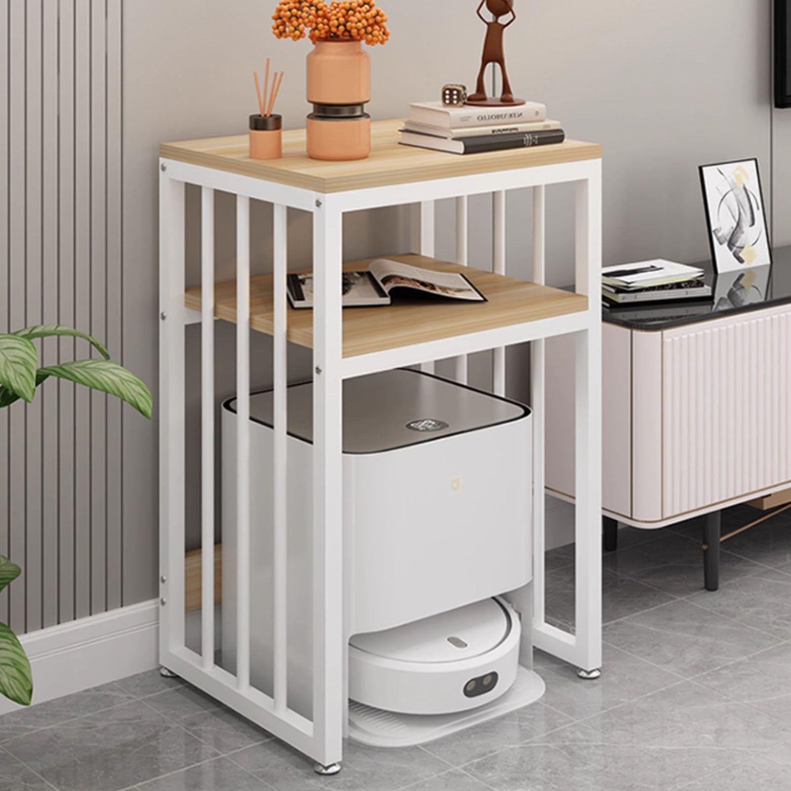 Meuble de rangement dissimulé pour aspirateur robot et salon épuré