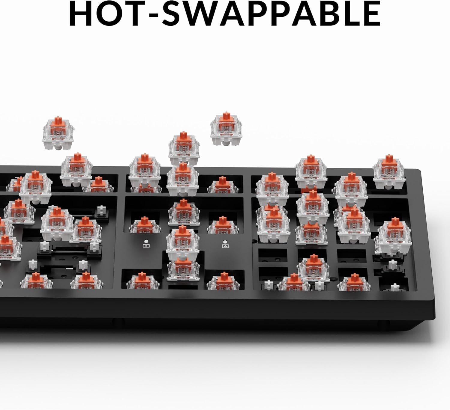 Close-up of the Keychron K10 Pro keyboard with several keycaps and switches removed, demonstrating its hot-swappable feature