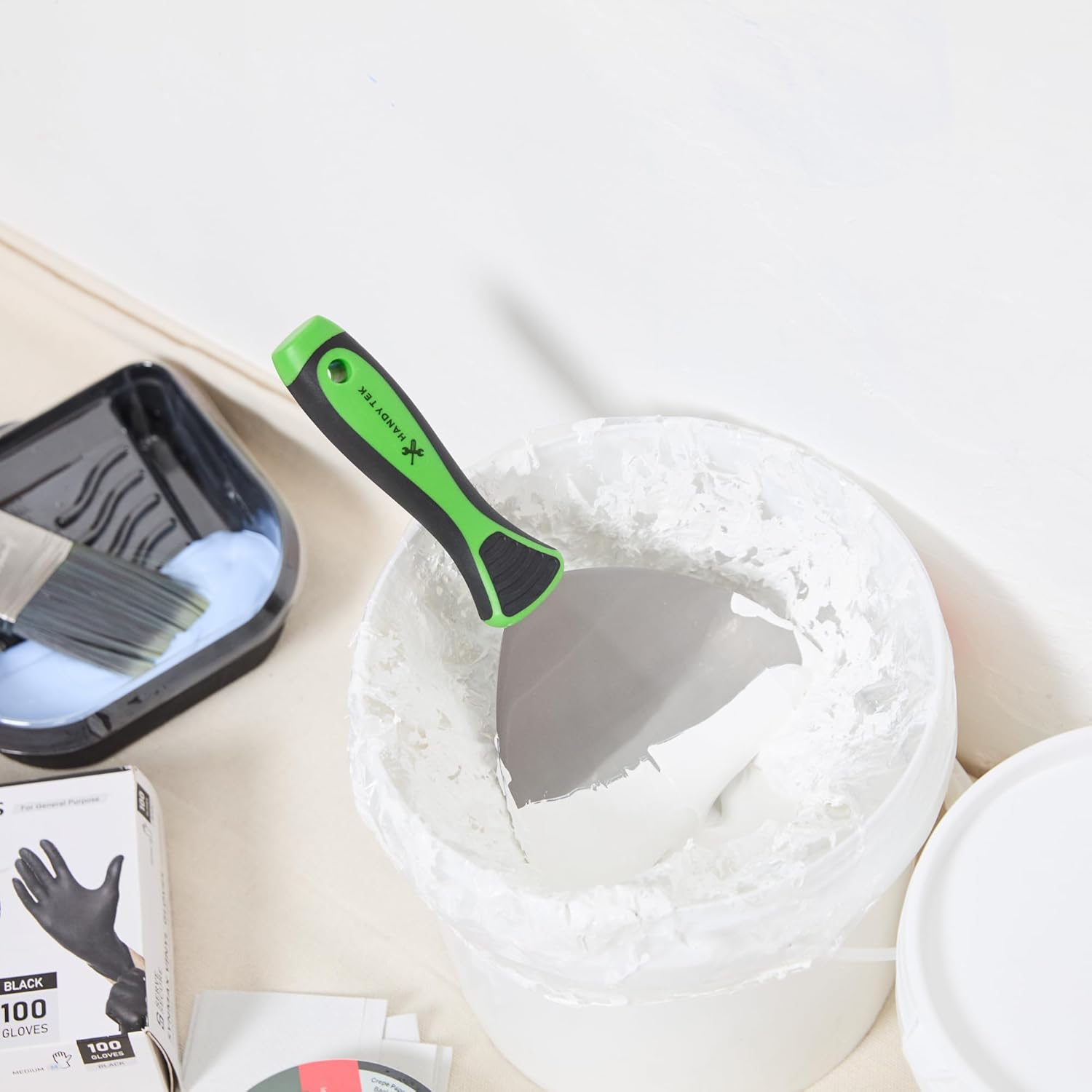 Restaurantware Putty Knife 6 Inch Flexible Carbon Steel Scraper Hammer End Soft Grip Handle 12 Taping Knife Tool for Repairing Drywall, Removing Wallpaper, Applying Putty, Plaster, Cement