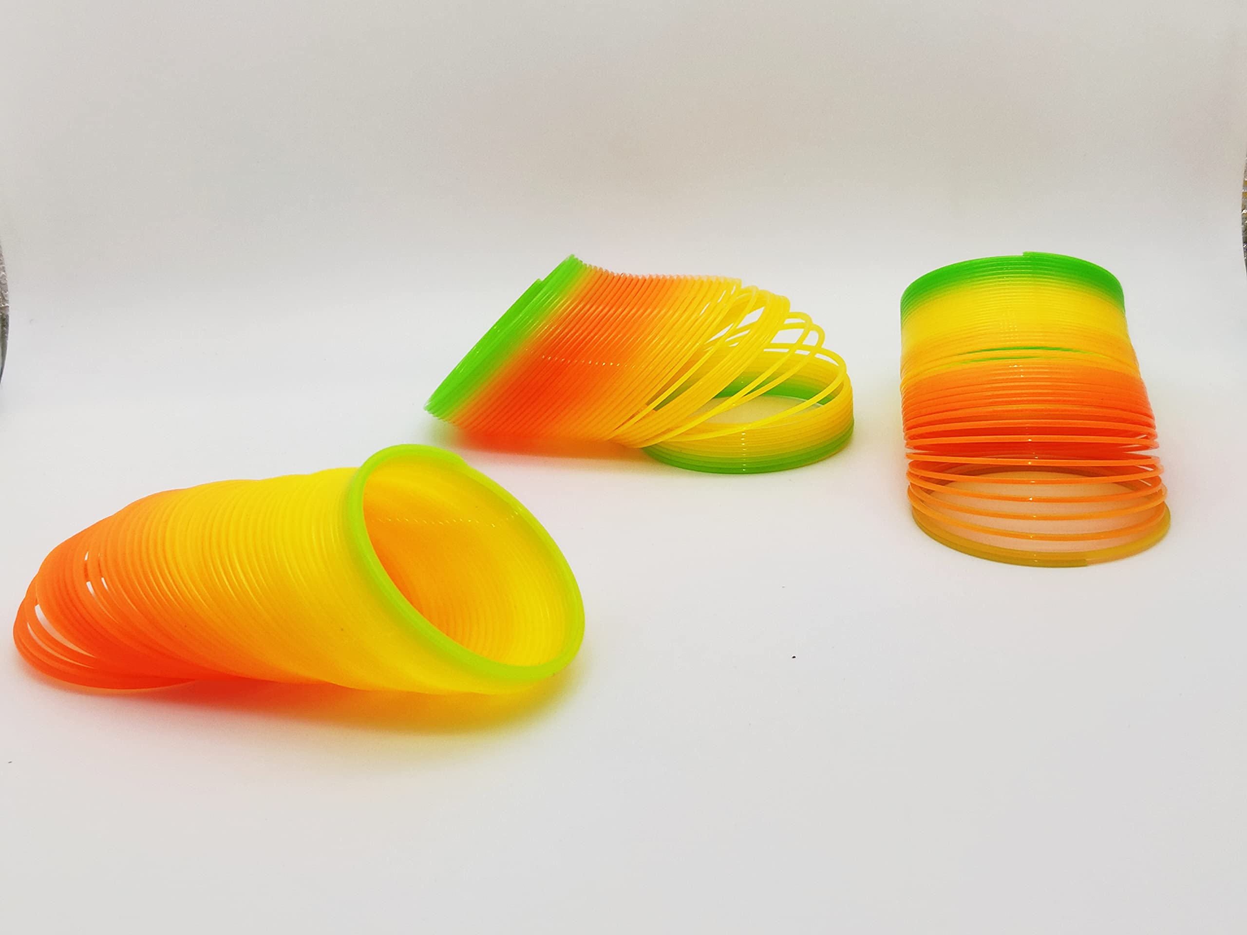 See Plastic Rainbow Magic Spring Toy- Multi Color. Pack Of Three Unique Big Size Plastic Bangle. - Kids 1