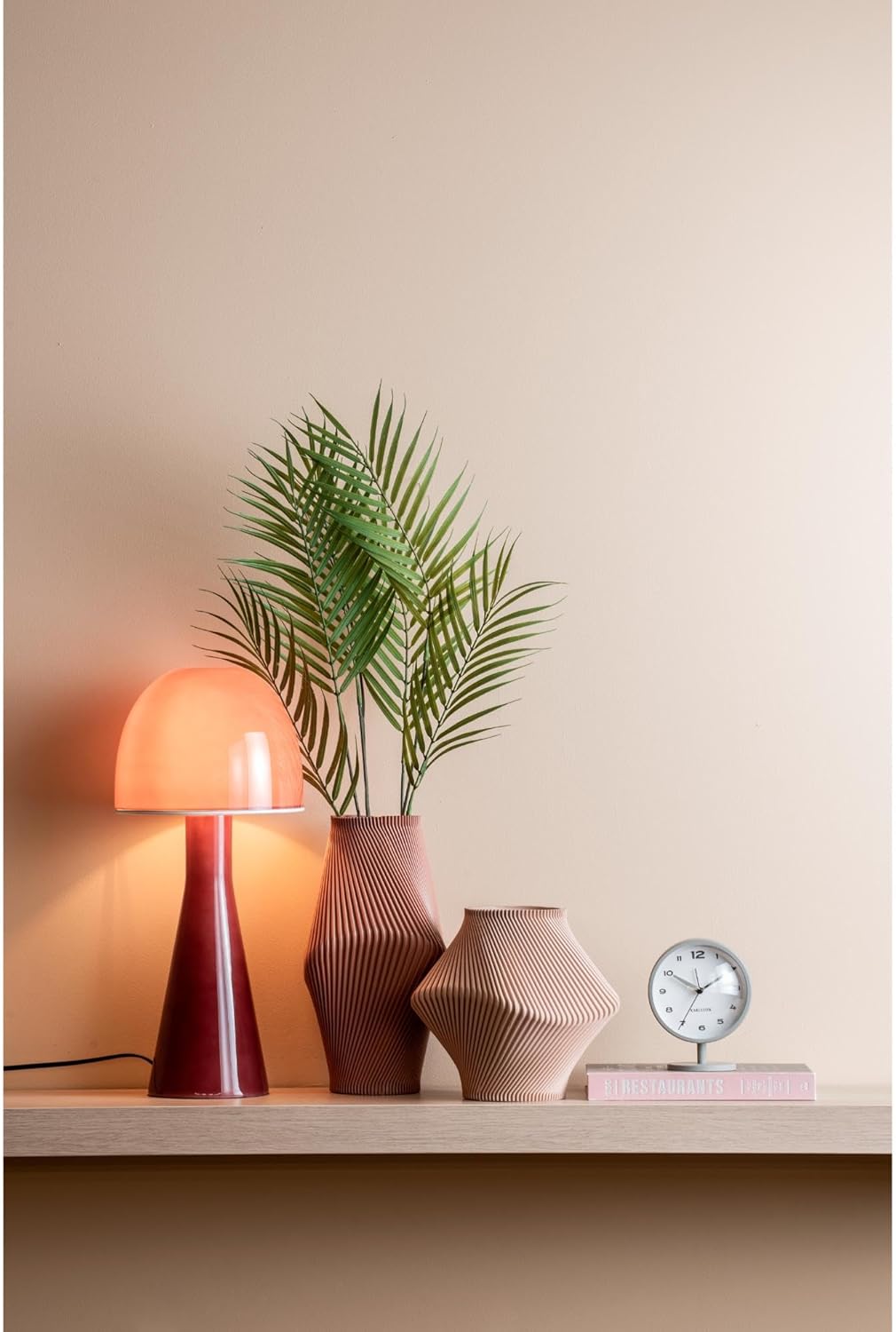 Karlsson Brisk Alarm Clock in a modern room setting