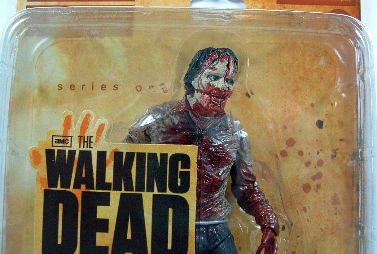 The Walking Dead McFarlane AMC TV Serie 1 – Short Card Action figura – Zombie Biter (with Biting Action)