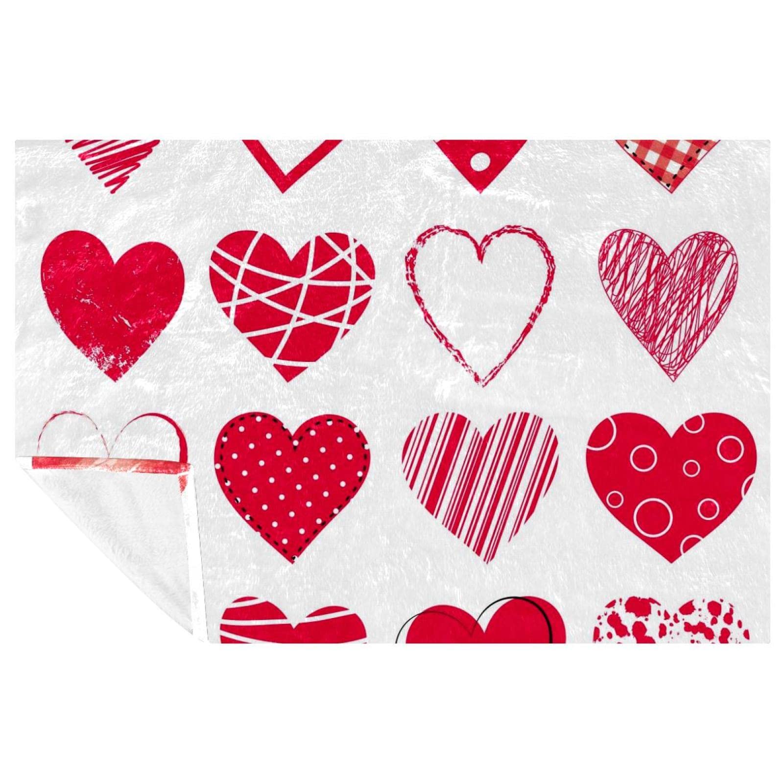 Couverture douce 150 x 100 cm, motif cœurs rouges texturé pour un confort toutes saisons