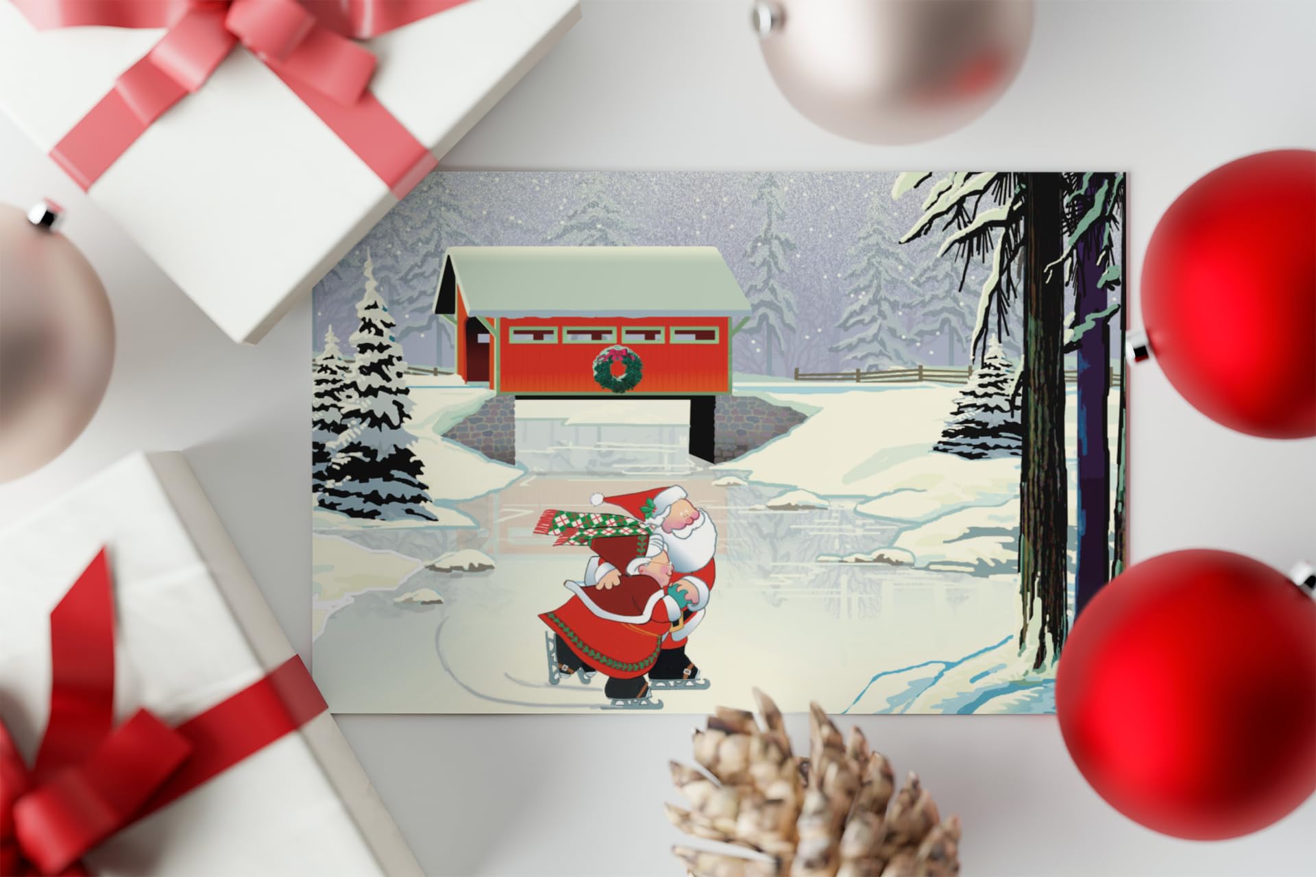 Stonehouse Collection Tarjetas de Navidad de Papá Noel y la Sra. Cláusula de patinaje sobre hielo | Tarjetas navideñas de bosque en un estanque congelado | Tarjetas de Navidad de puente cubierto rojo