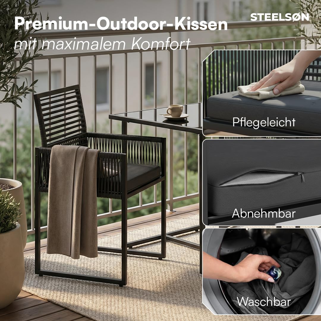 STEELSØN Kynaris Essgruppe 3-teilig schwarz – Balkonset mit 2 Stühlen und Tisch – Gartengarnitur wetterfest – Rattan Sitzgruppe mit klappbaren Stühlen – Terrassenmöbel Set mit Glasplatte & Sitzkissen
