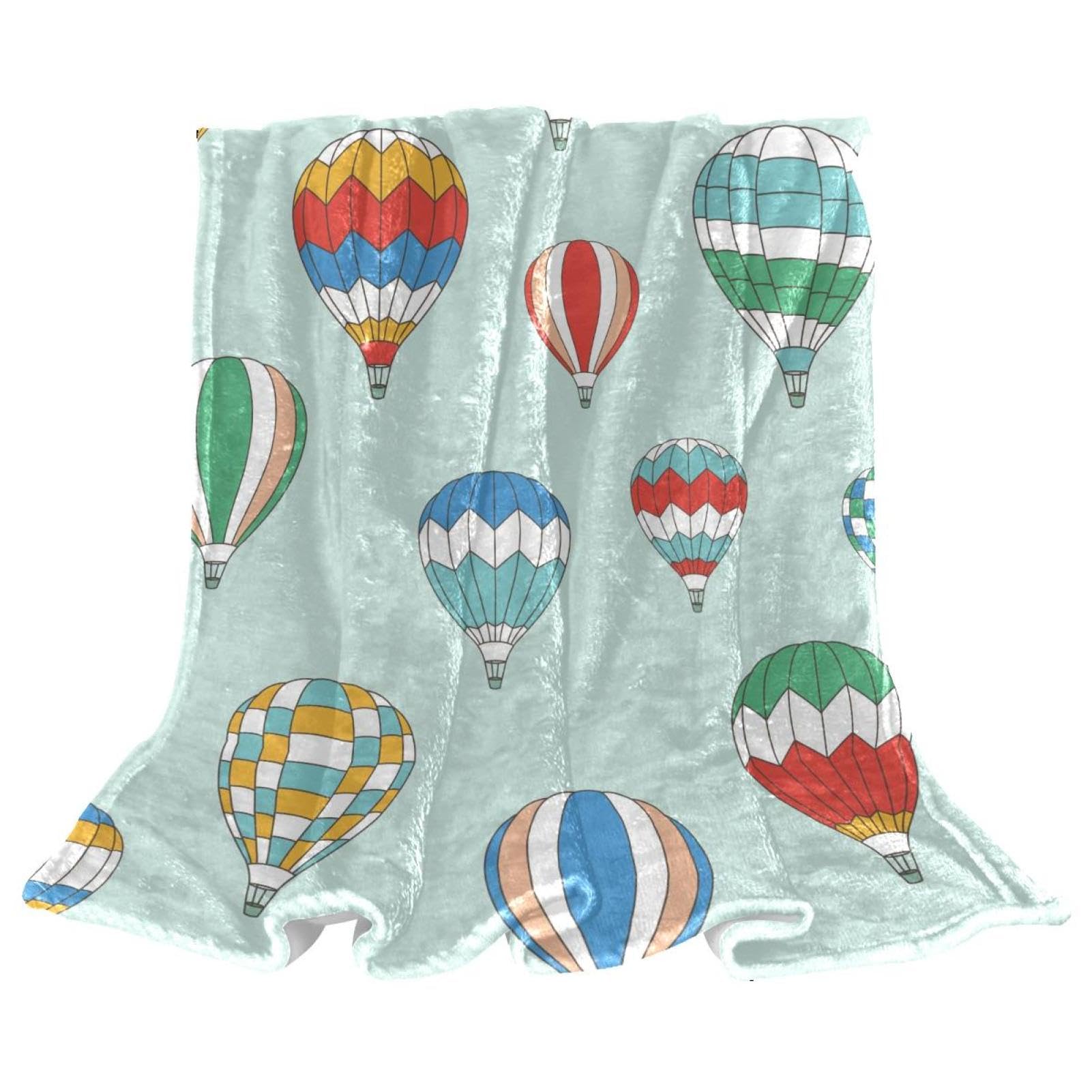Couverture polaire montgolfière pour ne plus jamais avoir froid sur votre canapé