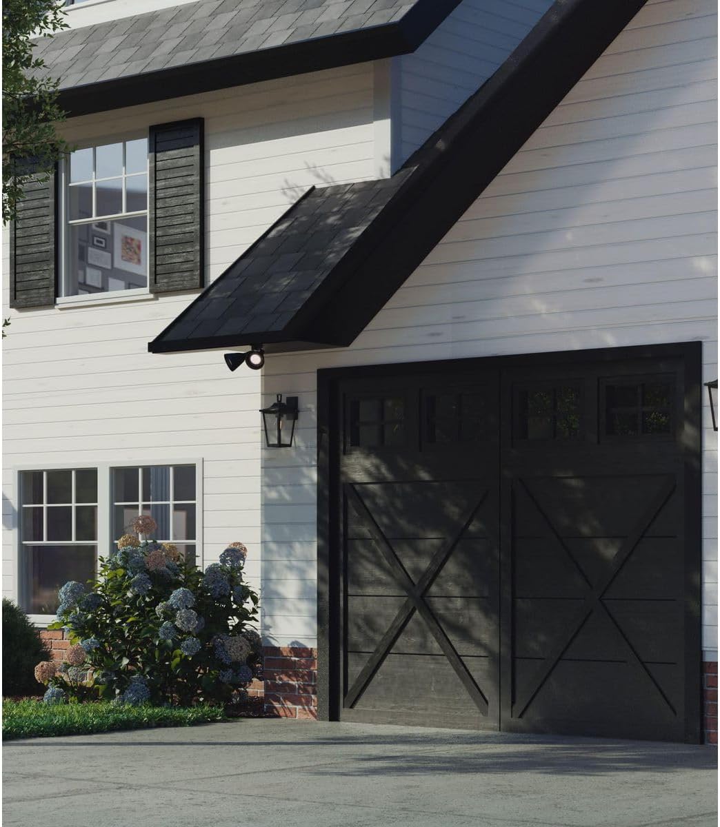 Progress Lighting P5203-31 flood light installed on a house exterior