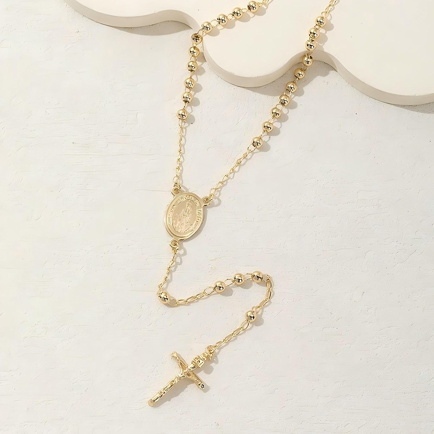 Gold long Necklace for Women Featuring The Virgin Mary, Rosary Cross, Y-shaped Sun Drop Dangles, and a Miracle Medal Pendant. It's a Beautiful Gift Idea!