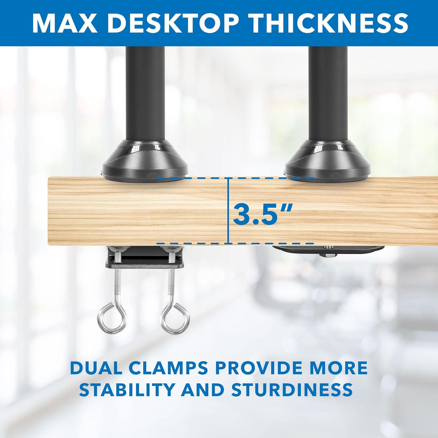 Close-up of the C-clamp base attached to a wooden desk, showing a maximum desktop thickness of 3.5 inches.