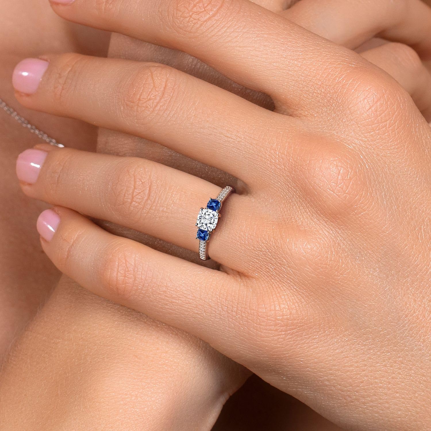 Gem Stone King White Moissanite and Blue Created Sapphire 3-Stone Engagement Ring For Women | 925 Silver | 0.96 Cttw | 3MM and 5MM Cushion | 3 Stone Wedding Anniversary Ring For Women