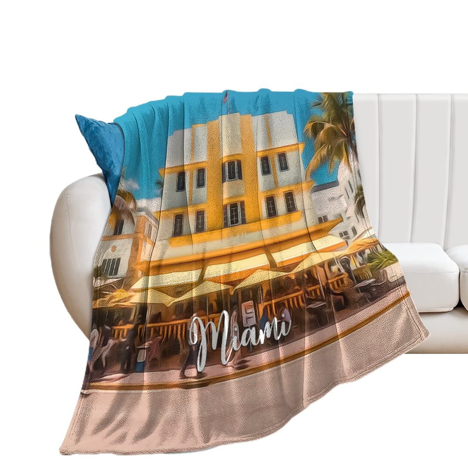 Couverture en flanelle Miami chaude pour soulager les frissons sur le canapé ou au bureau