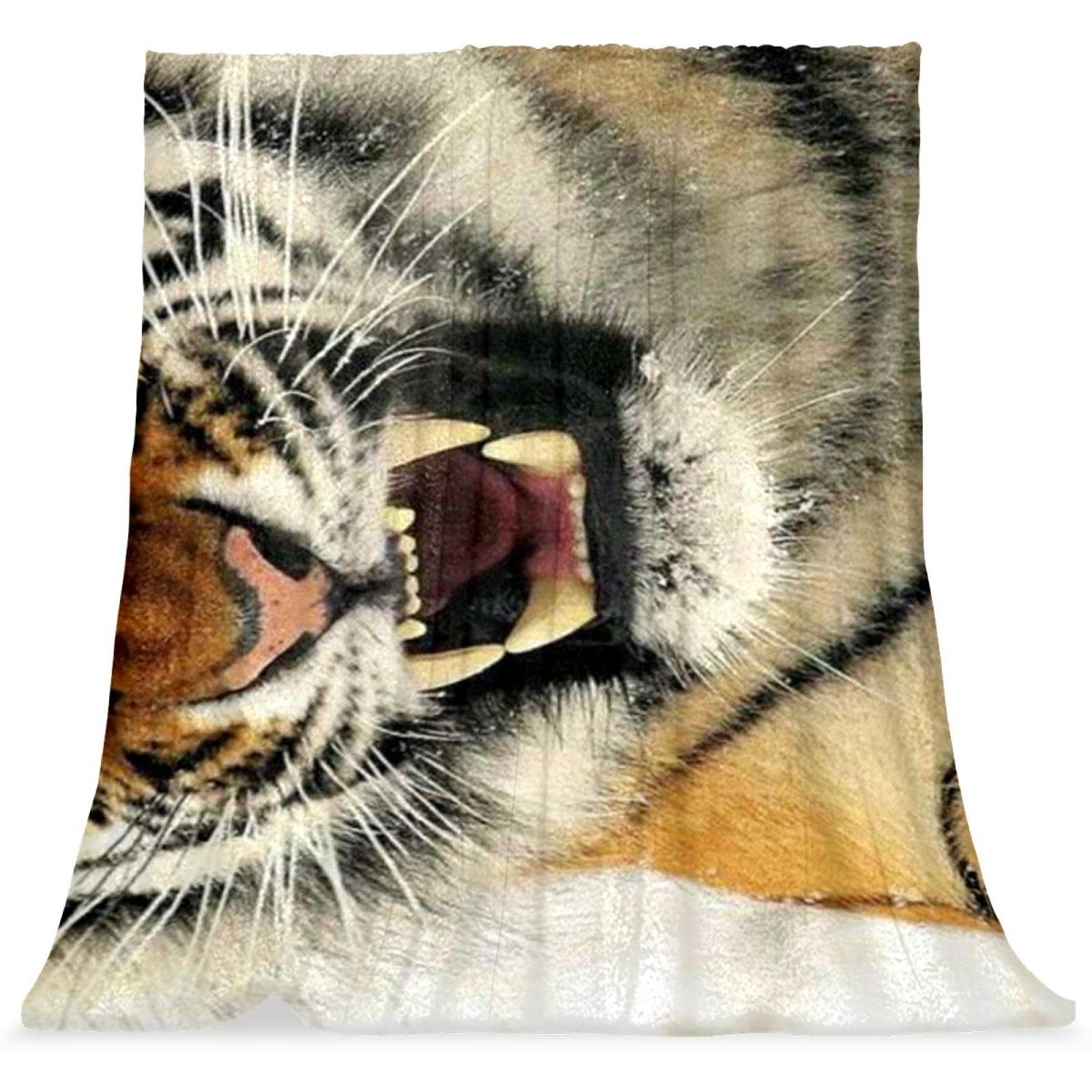 Couverture de lit tigre pour des soirées cocooning et douillettes en hiver