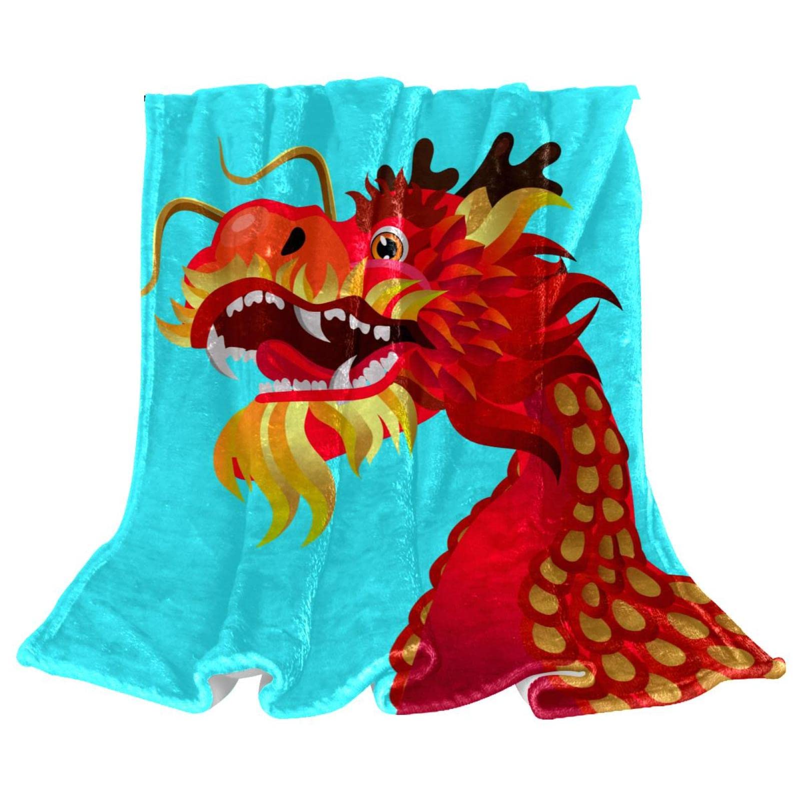 Couverture polaire bleu dragon contre le froid sur le canapé en hiver