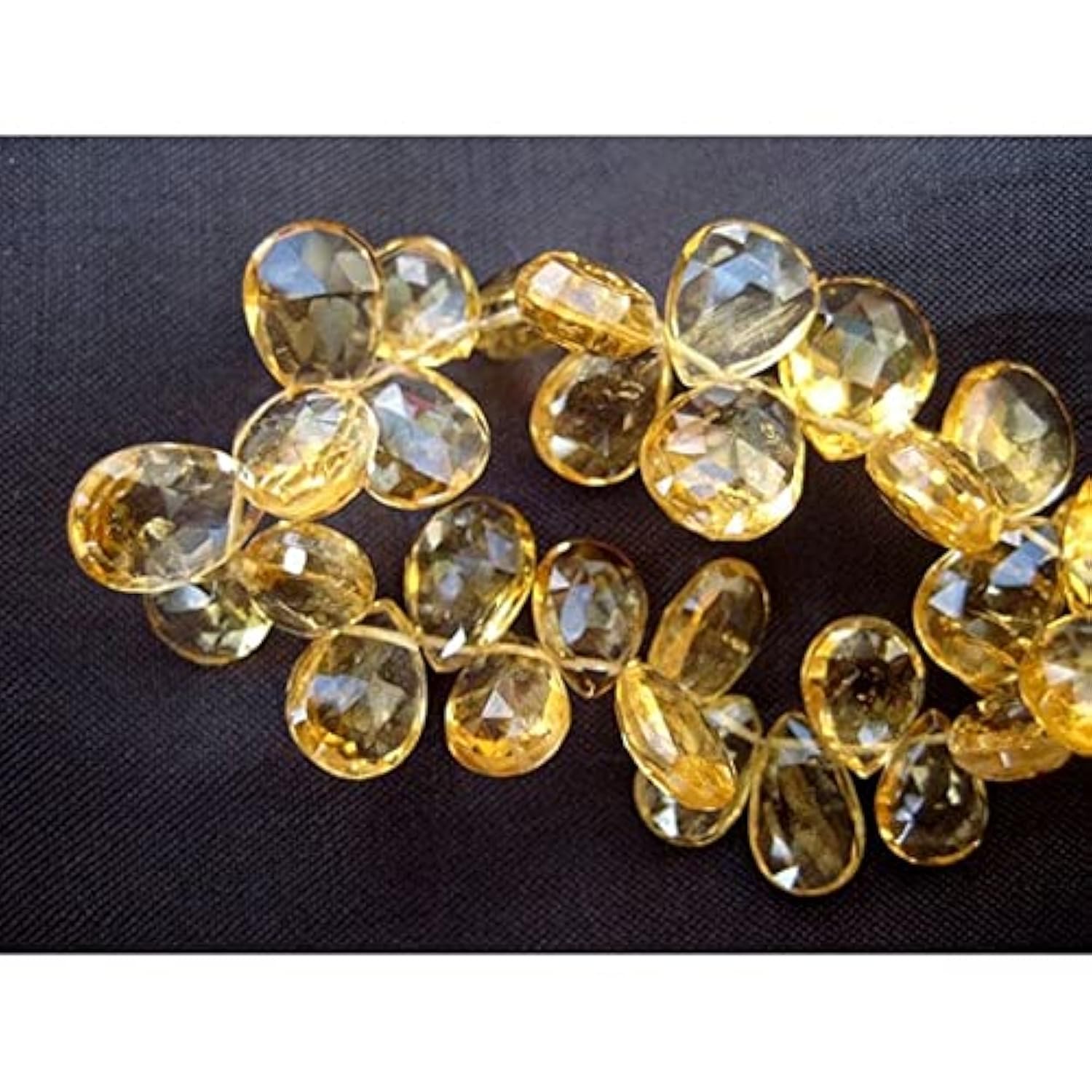 Citrine naturelle en poire facettée 7x5mm, gemme de lumière et éclat