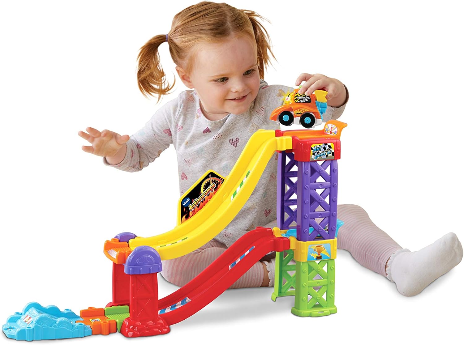 A child playing with the VTech Tut Tut Baby Speedster Action Ramp.