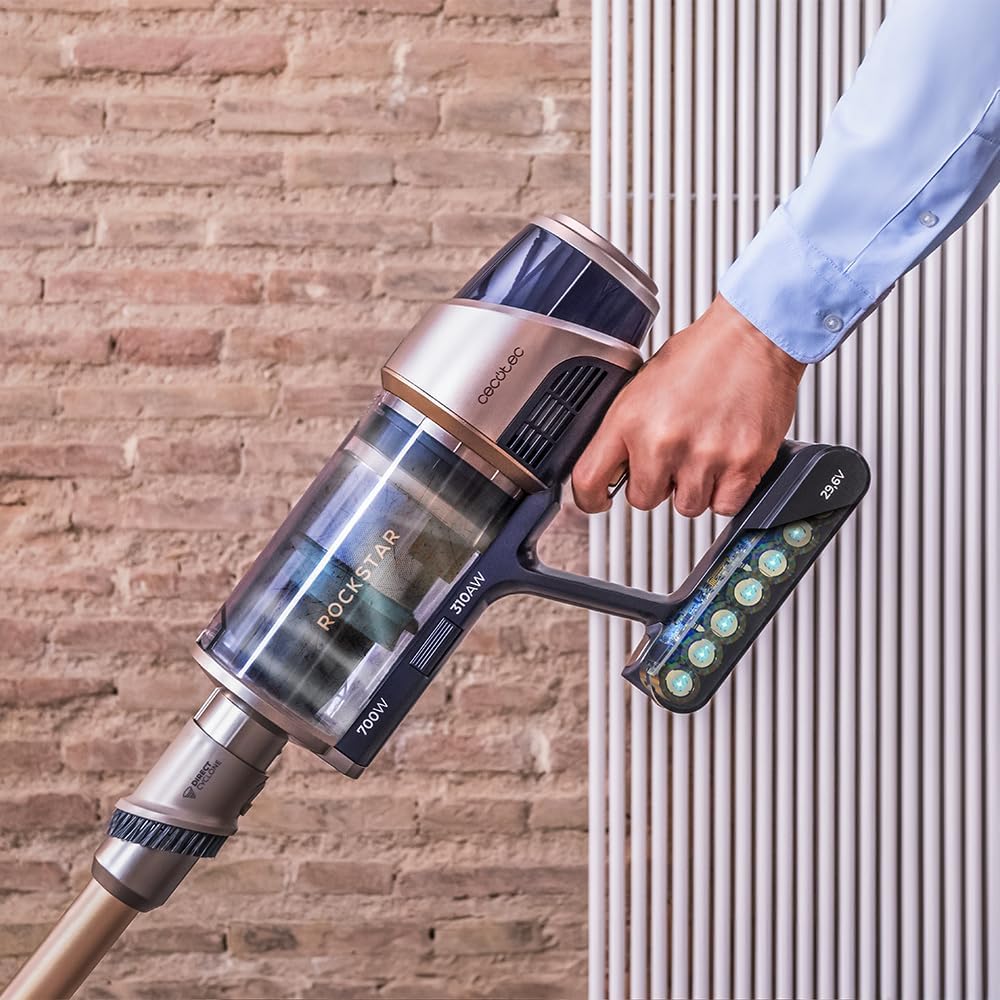 Close-up of the Anti-Tangle brush head with hair and an inset showing the clean brush.