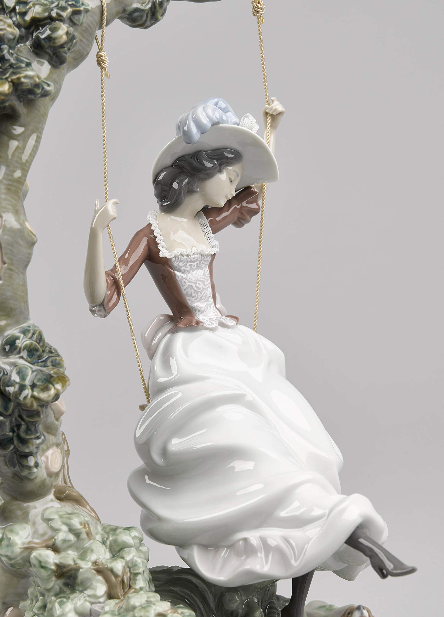 LLADRÓ Swinging Woman Figurine. Porcelain Figure Figure. : Amazon