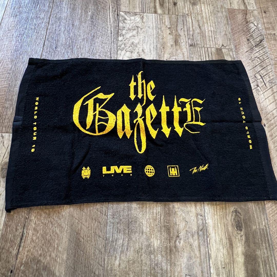 Amazon.co.jp: the GazettE ワールドツアー特典 バンドロゴ入り ミニ