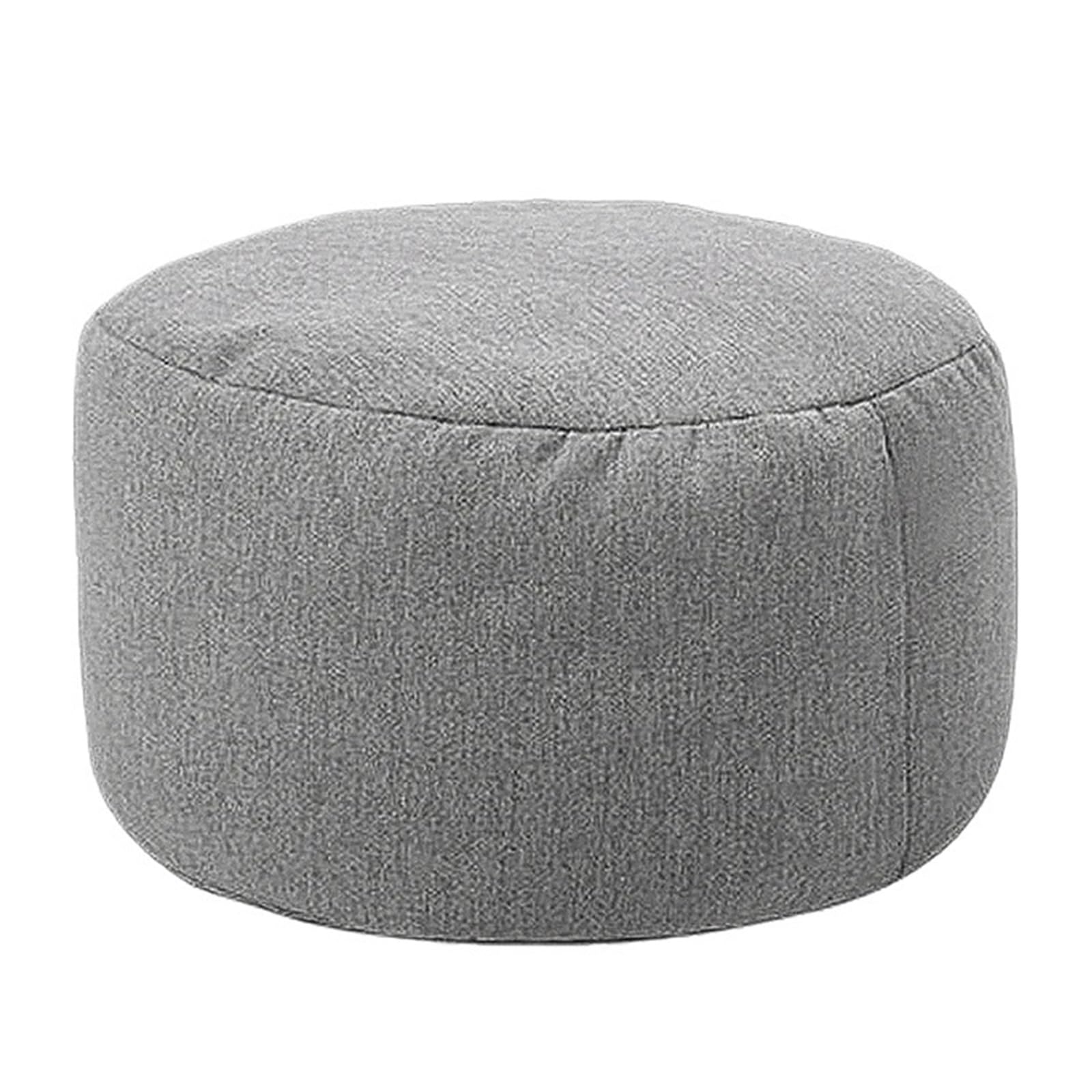 Pouf rond en lin gris foncé pour créer un coin lecture cosy