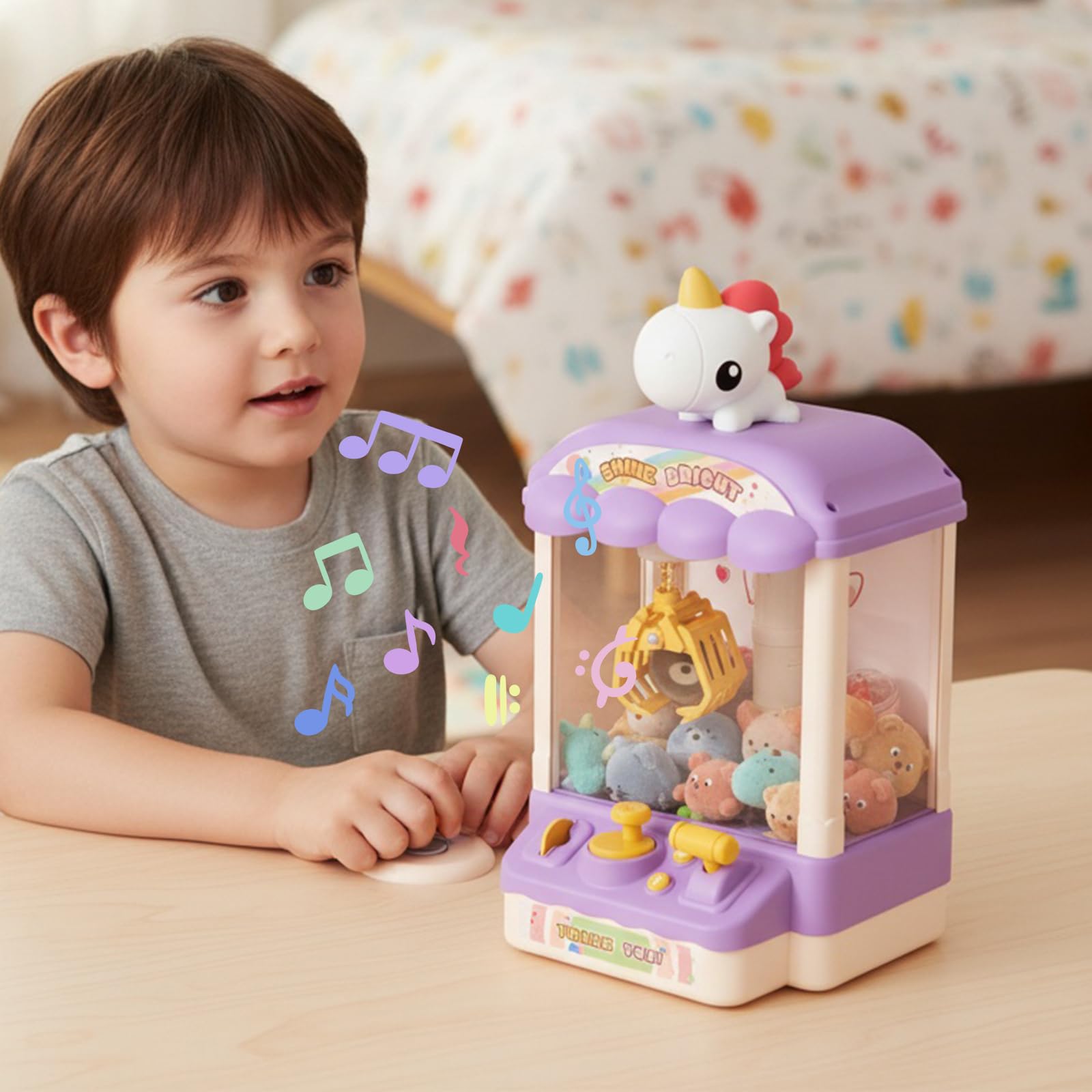 Belle machine à griffes avec son et jouet en peluche