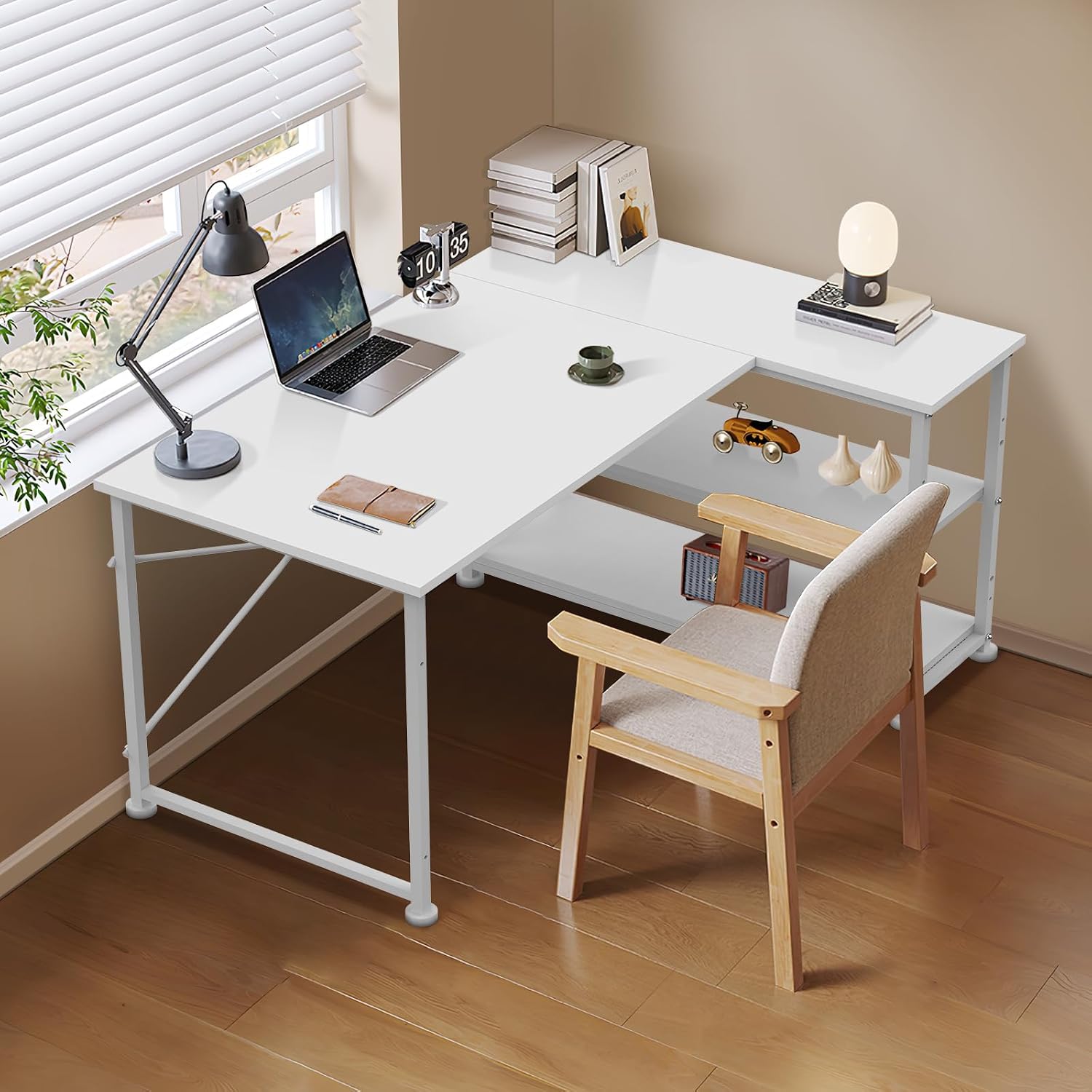 L-shaped desk in a home office setting with a laptop and decor