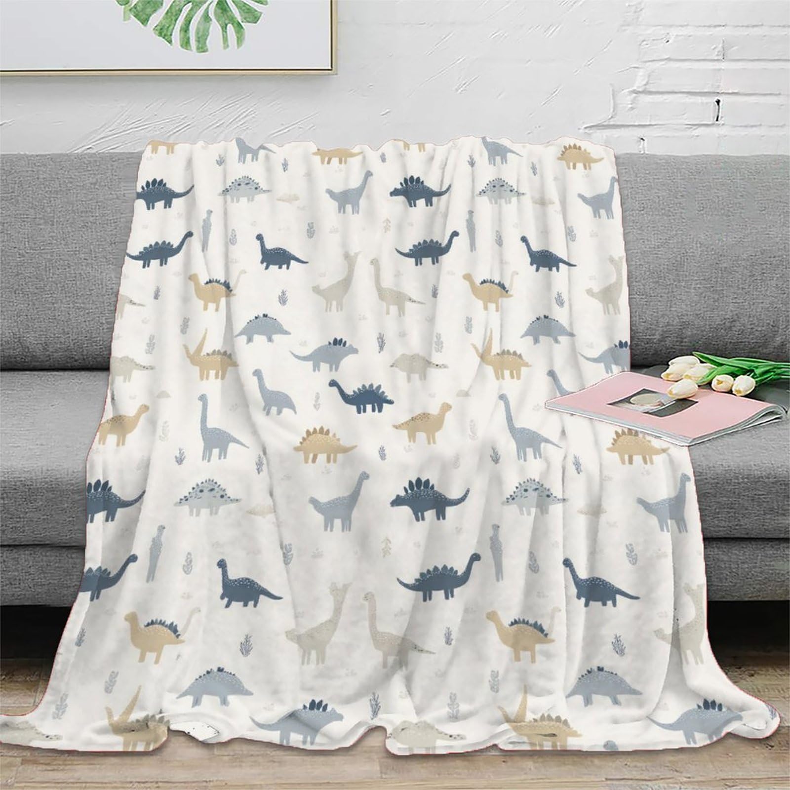 Couverture plaid dinosaure pour des soirées cocooning en famille devant la télé