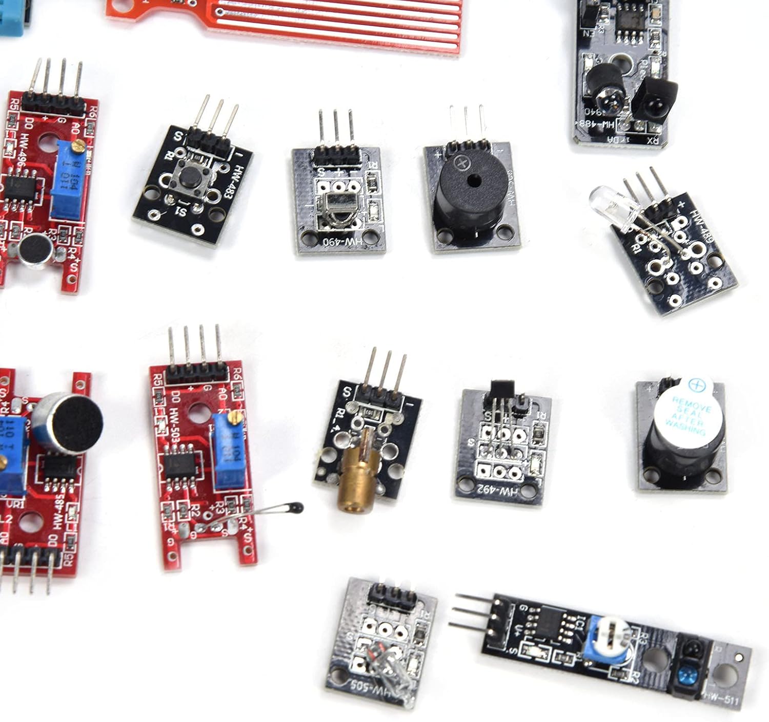 Close-up view of various small electronic modules, including a microphone sensor and a three-color LED module