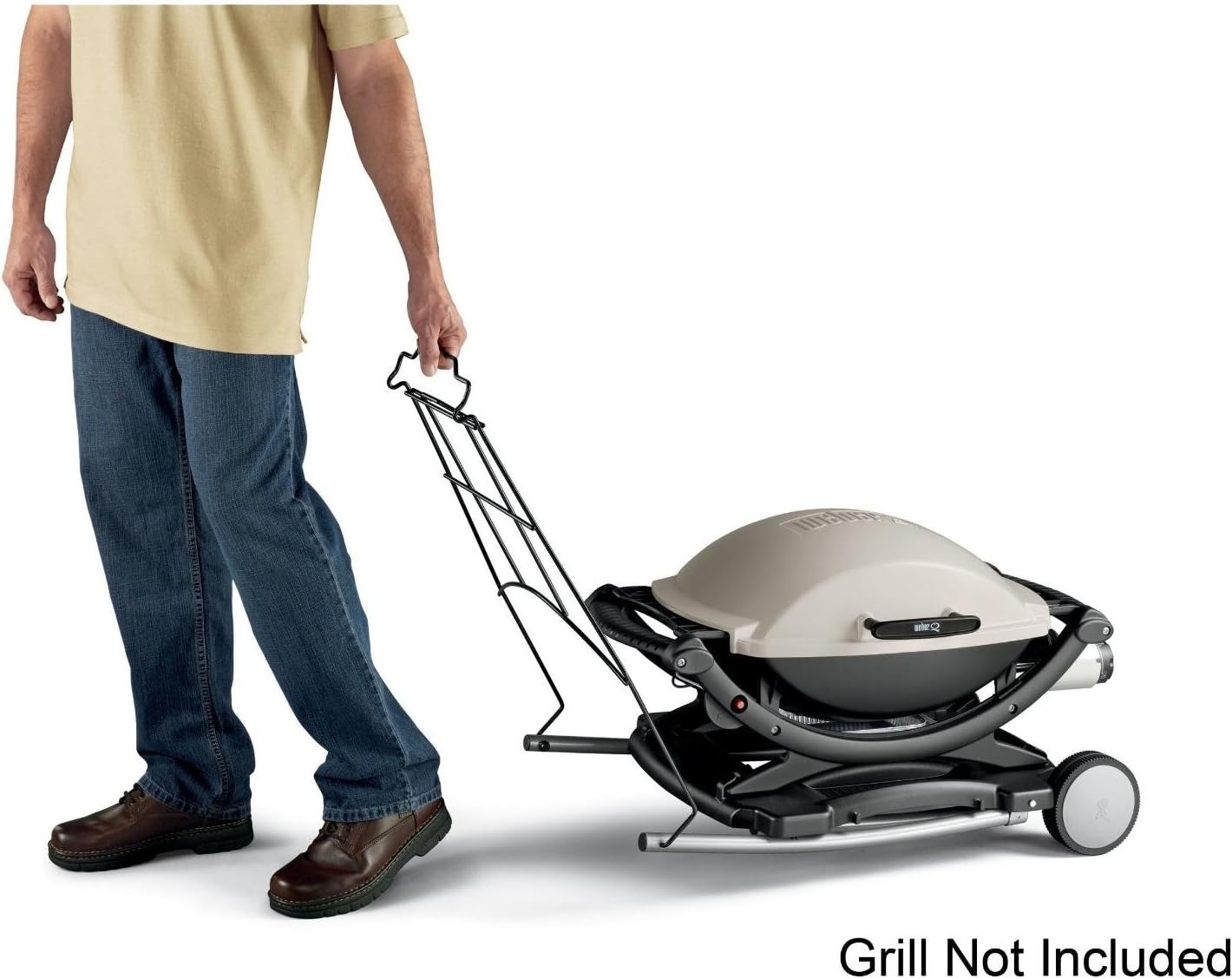 Person pulling a Weber Q grill on the folded Weber Q Rolling Cart in caddy mode.