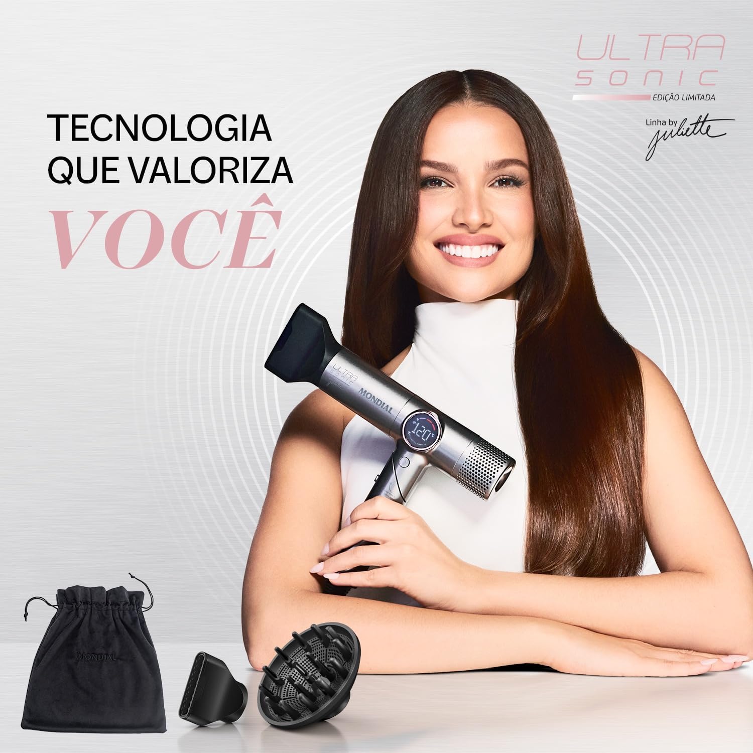 Imagem frontal do secador de cabelo com fundo claro e texturizado.