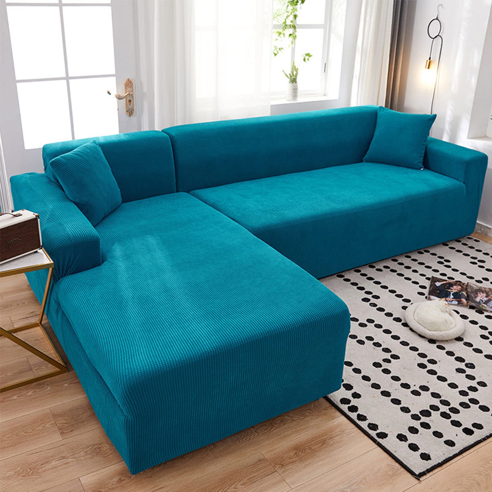 Housse de canapé extensible verte pour rénover un meuble usé facilement