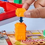 Monopoly GO! Jeux de société , Inspiré par le jeu de société mobile populaire , Ages 8+ | 2-4 Joueurs 15 Jeux de famille pour enfants et adultes (anglais) & Français)