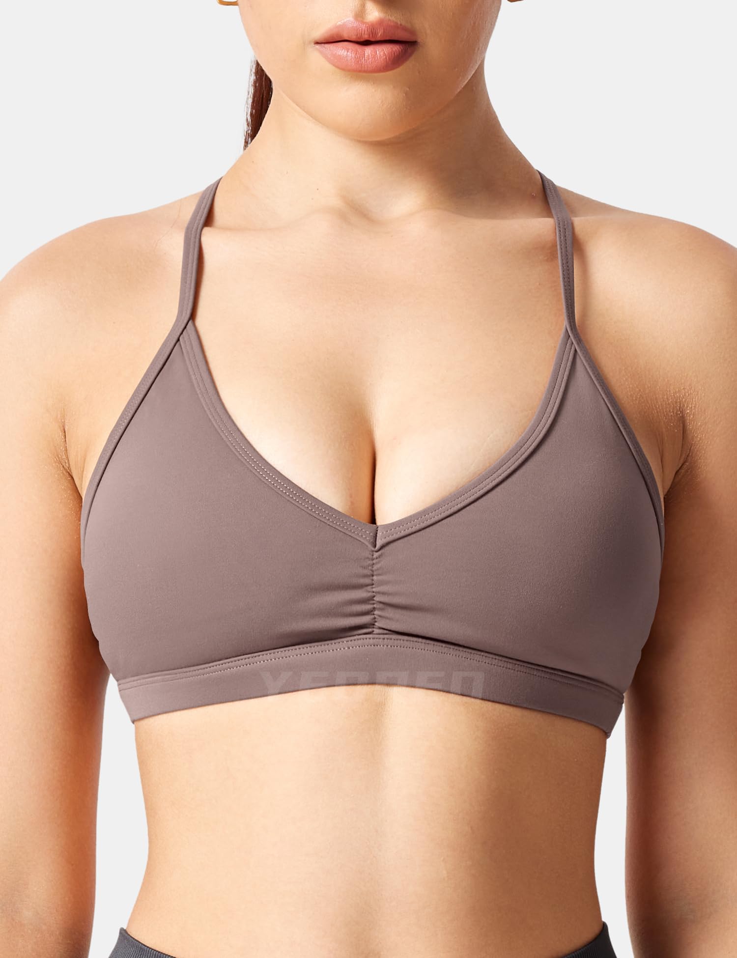 YEOREO Biustonosze sportowe dla kobiet wyściełany biustonosz treningowy bez pleców Karlena Low Impact Criss Cross Yoga Crop Tank Top