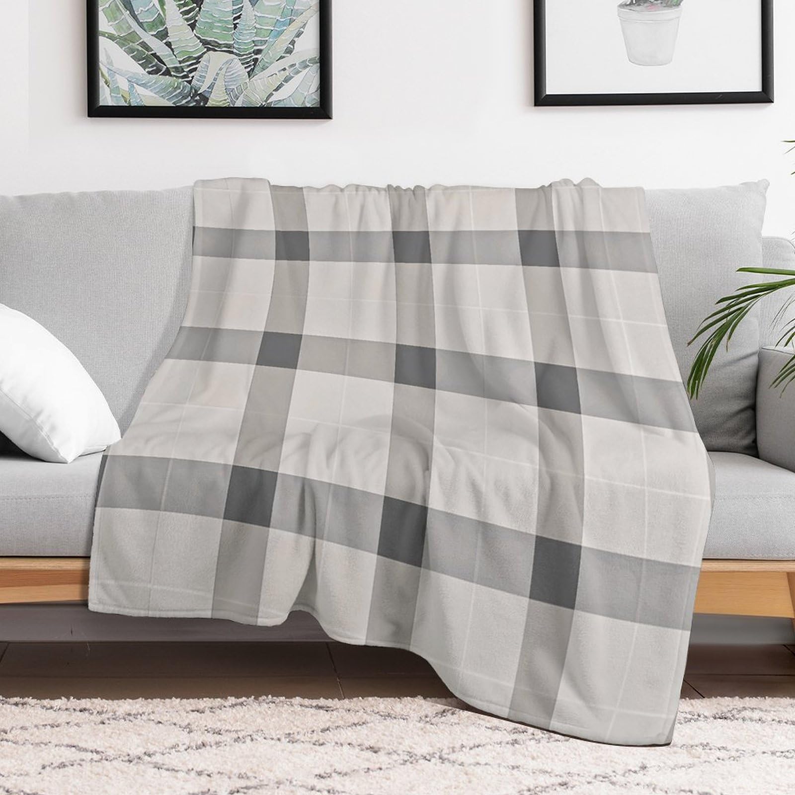 Couverture en micro polaire pour climatisation et soirées cocooning sur le canapé