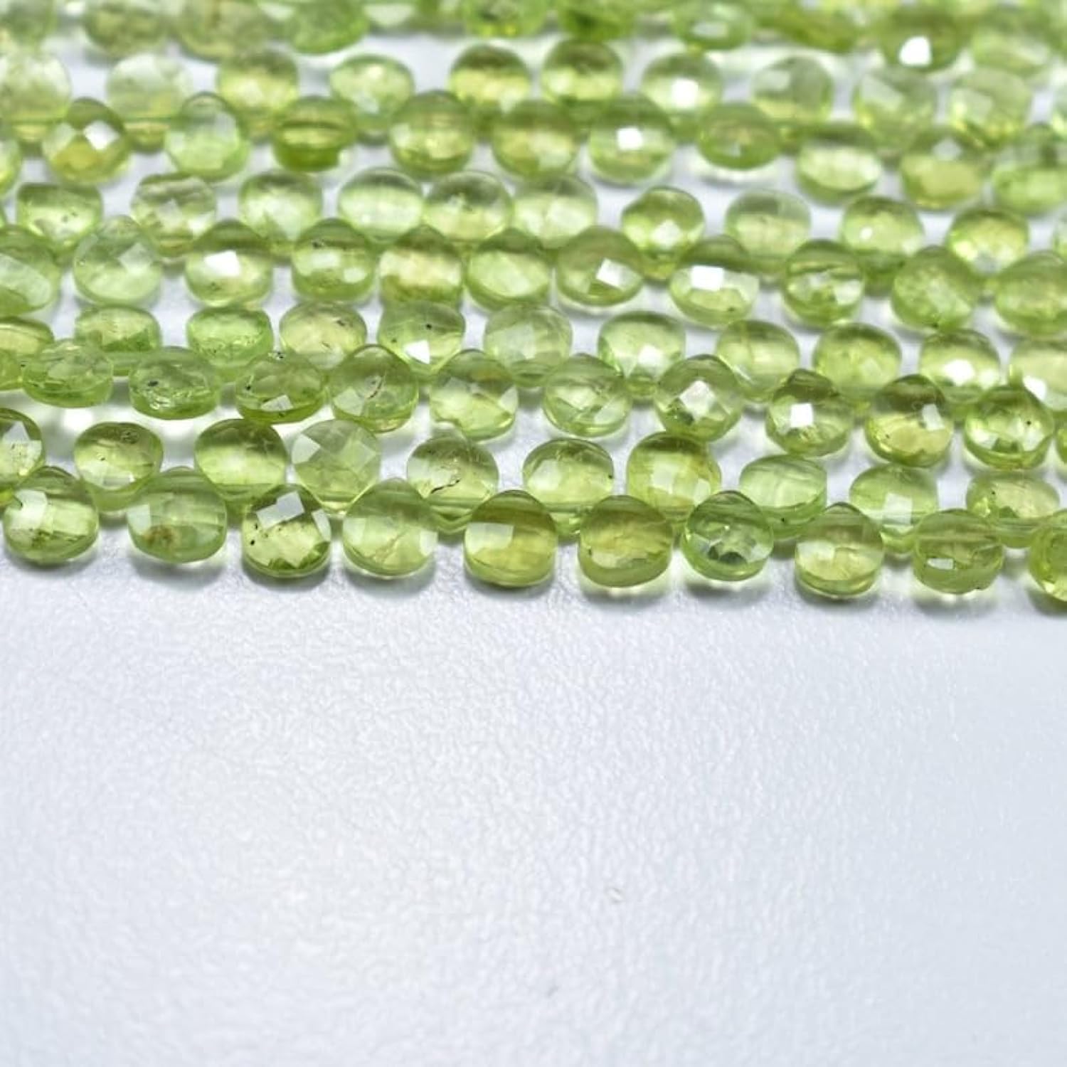Perles en péridot naturel de 4.5mm : des pierres régulières pour éviter les blocages de fil