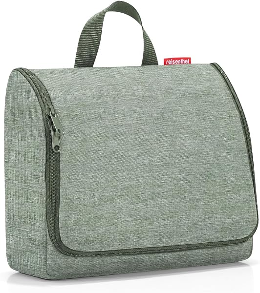 Gros plan sur le crochet de suspension robuste et les multiples compartiments internes de la trousse de toilette reisenthel Toiletbag XL.