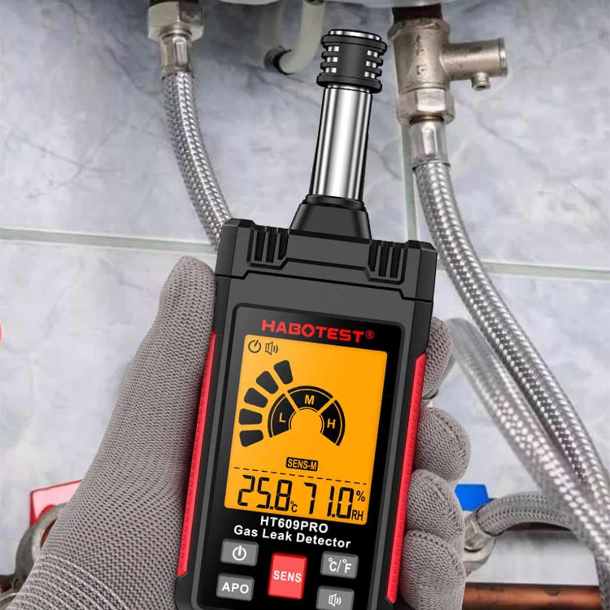 HT609PRO Gas Leak Detector in use near pipes