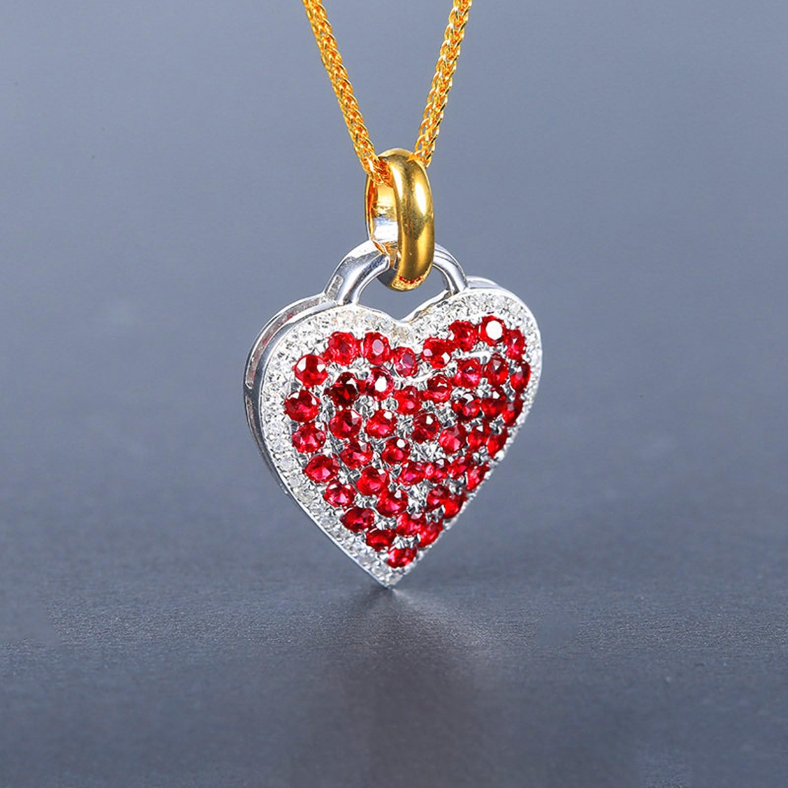Colgante de corazón bicolor 375 585 750 con rubí 1,1 ct