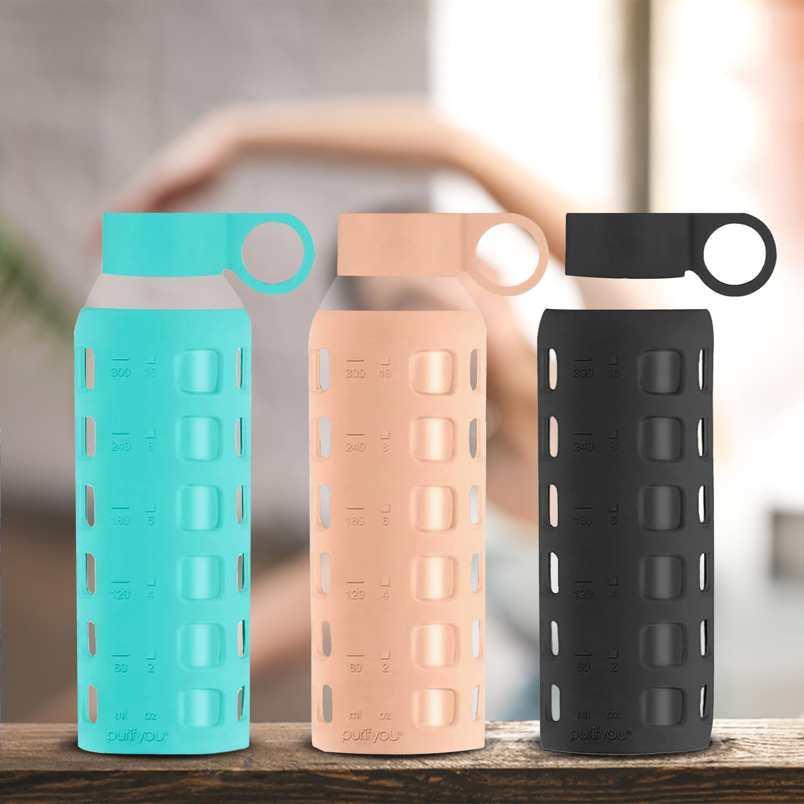 purifyouGlass Water Bottle Bundle with Time & Volume Markings: This set features three reusable glass bottles in distinct colors: Aqua Blue (12oz), Hazel Nut (12oz), and Jet Black (12oz).