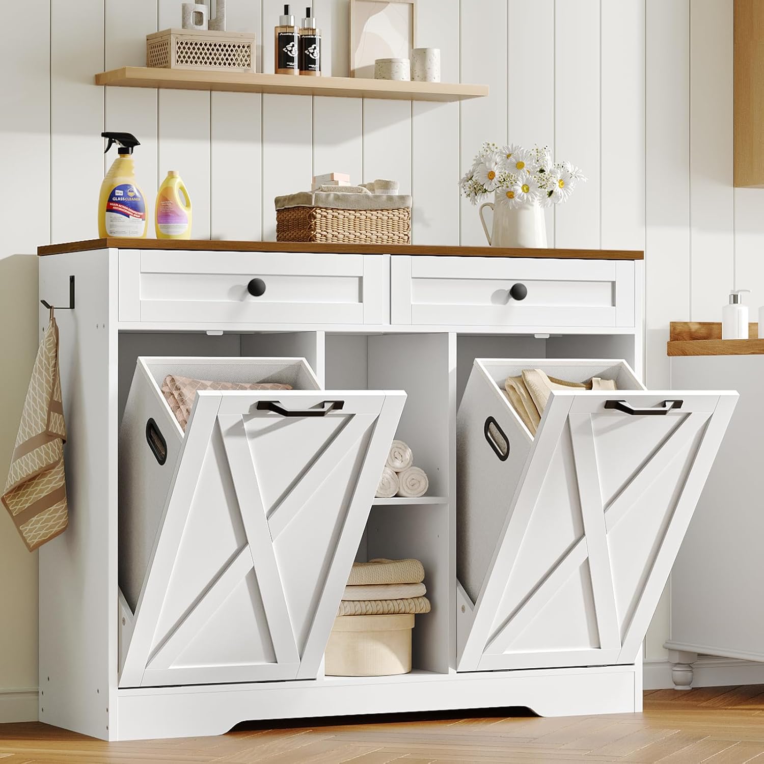 tilt out laundry hamper cabinet in white and walnut showing drawers and open shelving
