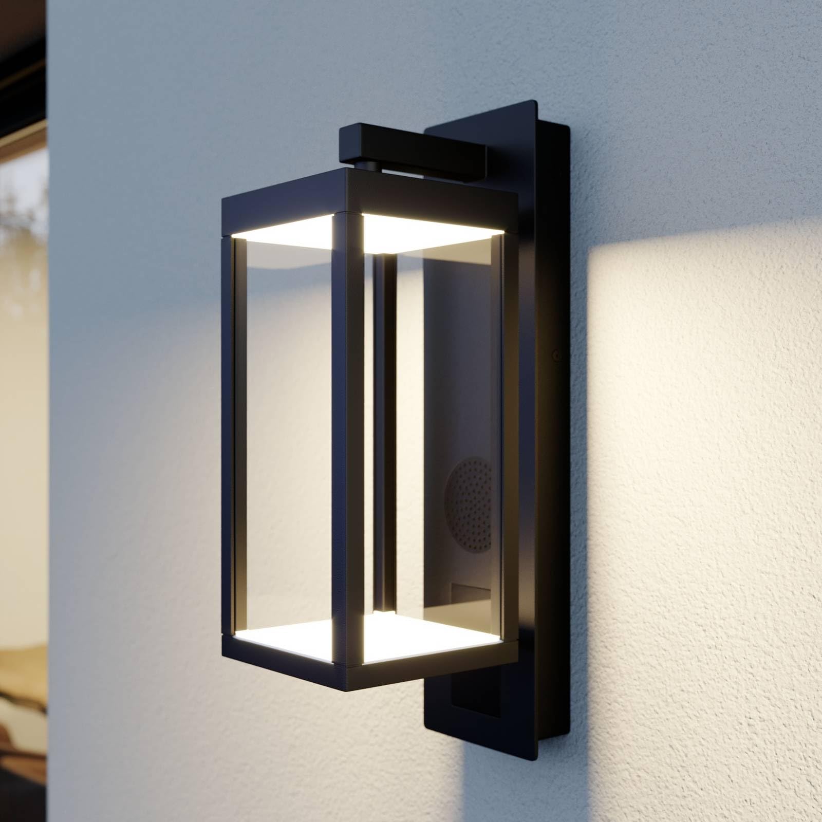 Lucande Lampada da Parete Esterno con Altoparlante Bluetooth, Luce per Portico Porta Ingresso Lanterna Esterni Antiruggine in Vetro Trasparente Impermeabile Alluminio Nero