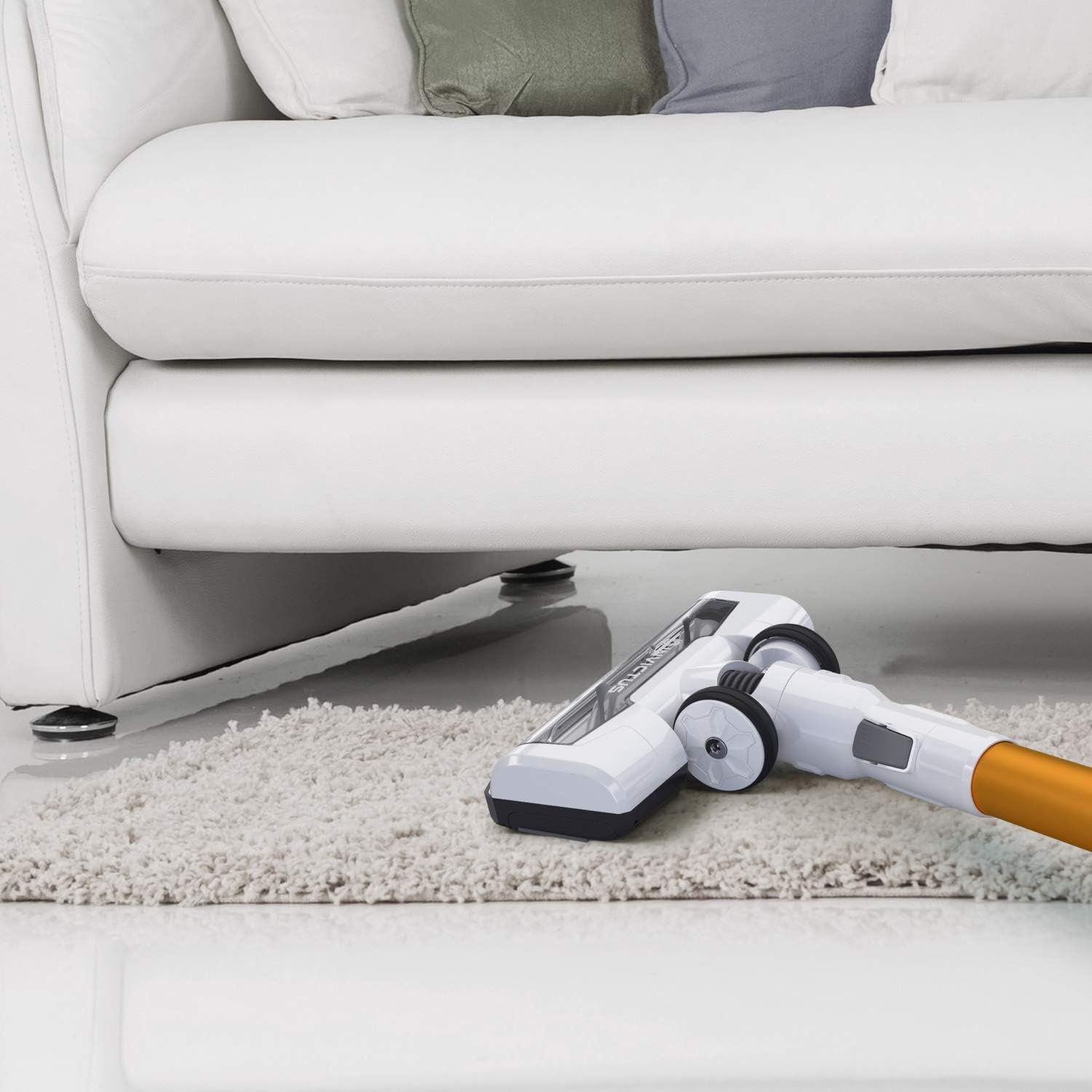 Genius Invictus X5 vacuum cleaning under a sofa