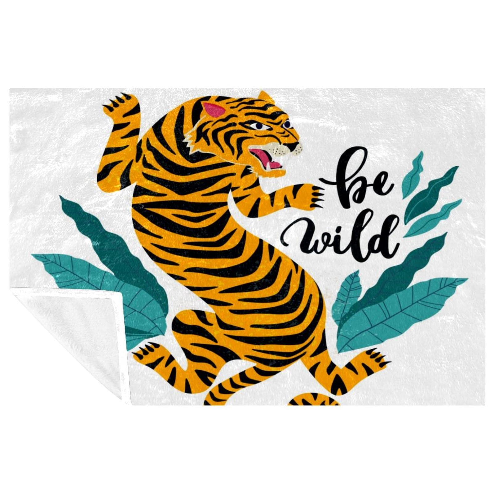 Couverture douce motif tigre pour vos soirées canapé et sorties pique-nique