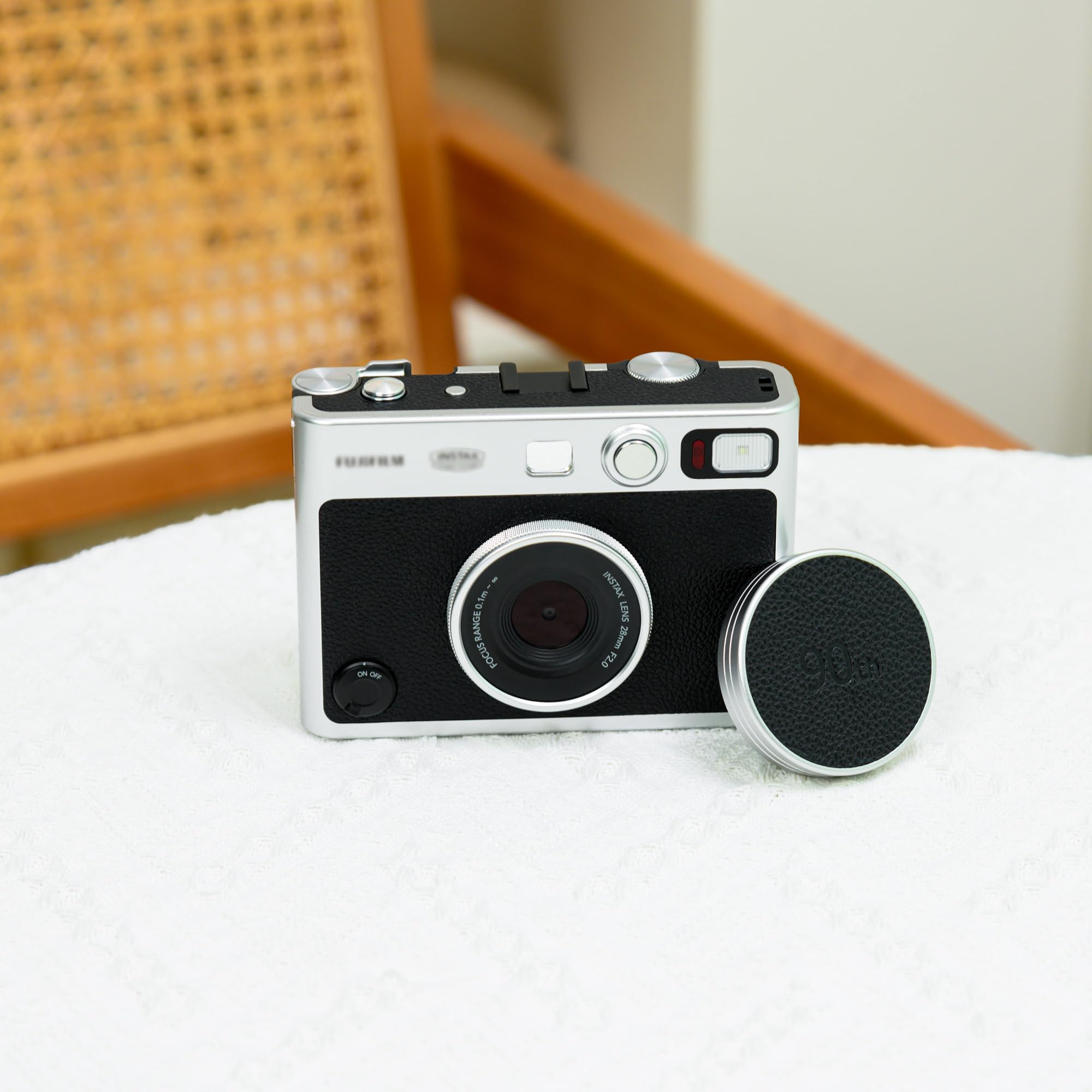 JJC Metalowa osłona obiektywu do aparatu fotograficznego Fuji Instax Mini Evo, akcesoria Mini EVO aluminiowa osłona obiektywu ze skórzaną powierzchnią i miękką stroną wewnętrzną z tworzywa EVA, czarna