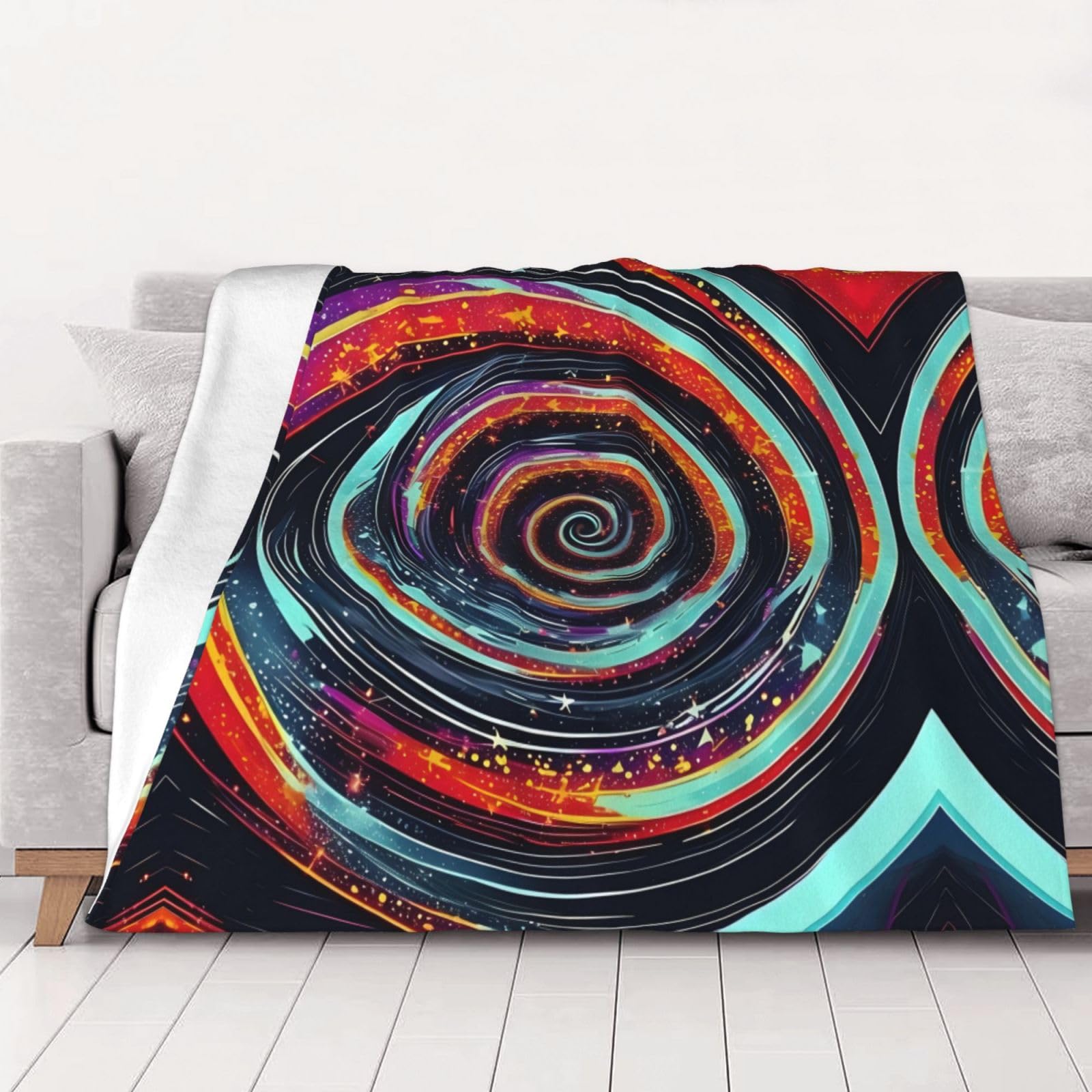 Couverture polaire espace pour des soirées cocooning sur le canapé