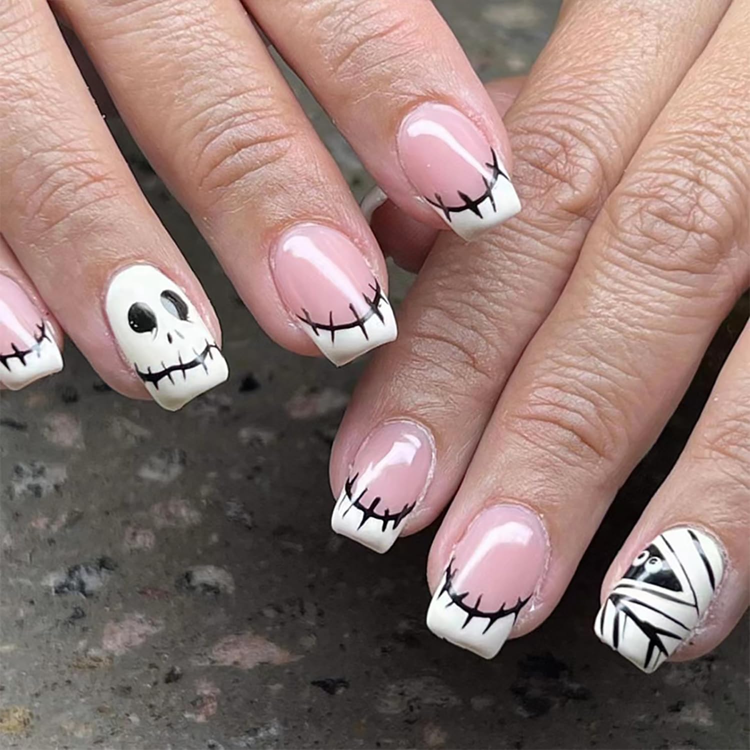 halloween press on nails short square fake nails nude pink false nails with skeleton and mummy designs full cover glossy french nails for women halloween manicure art 24 pcs style29